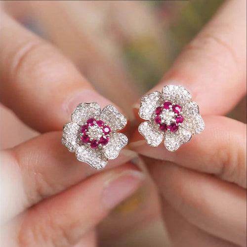 Product view showing colored-center floral cluster stud earrings
