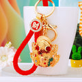 Jeweled Golden Toad Keychains with Fortune Cords and Loose Heart Loops view 1