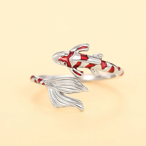 Silver koi open adjustable ring with red enamel on cream background
