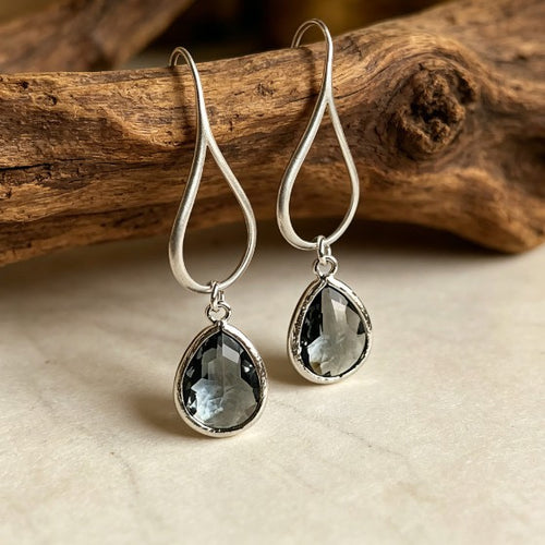 Angled long teardrop loops and clear gray stones