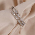Silver Tone Oval Hoop Earrings With Marquise Clear Stones view 3
