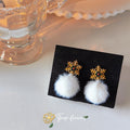 Gold Snowflake Stud Earrings With White Fur Pom Drop view 3