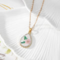 Gold Tone Teardrop Pressed Flower Pendant Necklaces in Five Designs view 2