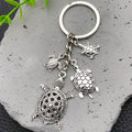 Two Silver Tone Turtle Family Keychain Designs with Metal Hardware view 4