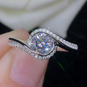 Silver Tone Round Crystal Swirl Halo Ring with Polished Finish