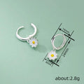 Silver Tone White Yellow Daisy Charm Huggie Hoop Earrings view 4