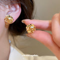 Rounded Floral Cluster Clip-On Earrings with Polished Metal Details view 4