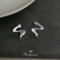 Silver-Tone Twisted Geometric Wave Line Metal Stud Earrings view 3