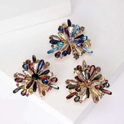 Radiating Crystal Flower Brooch in Three Colors displayed from the front