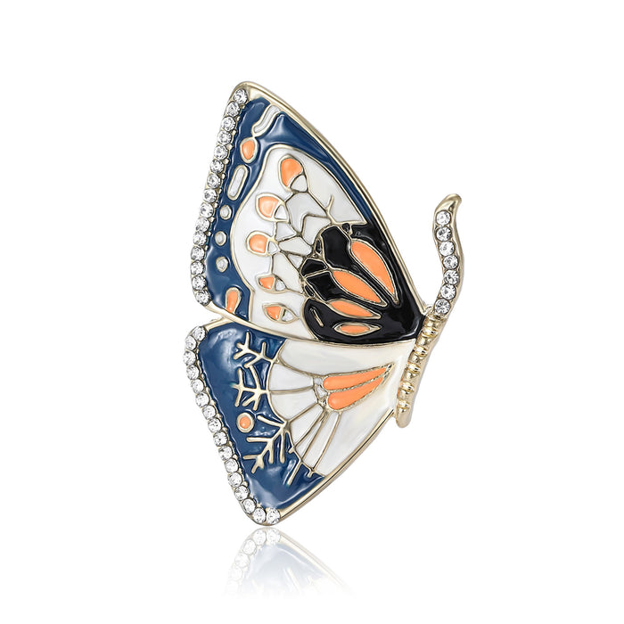 Blue Orange and White Enamel Butterfly Brooch With Crystals