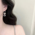 Silver Tone Hoop Earrings with Bead and Clear Drop Charms view 2