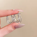 Silver Tone Double Loop Crossover Hoop Earrings Fashion Jewelry view 2
