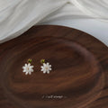 Gold Tone White Daisy Drop Stud Earrings With Green Flower Tops view 4