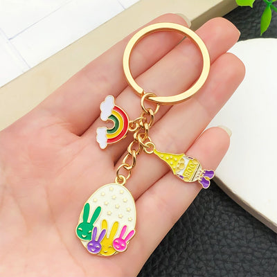 Overview showing the available color and design variations of the colorful rainbow rabbit easter egg metal keychain