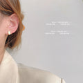 Gold-Tone Oval White Cat Eye Glass Mini Stud Earrings view 2