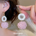 Fuzzy Double Pom Pom Drop Earrings in Pink and Gray view 3