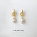 Gold Tone Sculpted Knot Irregular White Pearl Drop Earrings view 1