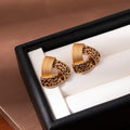 Gold and Silver Leopard Print Curved Triangle Stud Earrings view 6