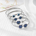 Silver Tone Blue Evil Eye Open Cuff Bracelets in Four Designs view 2