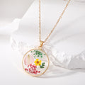 Gold Tone Round Pressed Flower Resin Necklace and Earring Options view 2