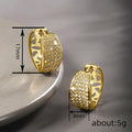 Gold Tone Pave Huggie Hoop Earrings Wide Clear CZ Band view 4