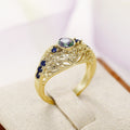 Opalescent Oval Blue Stone Filigree Ring In Two Metal Tones view 3