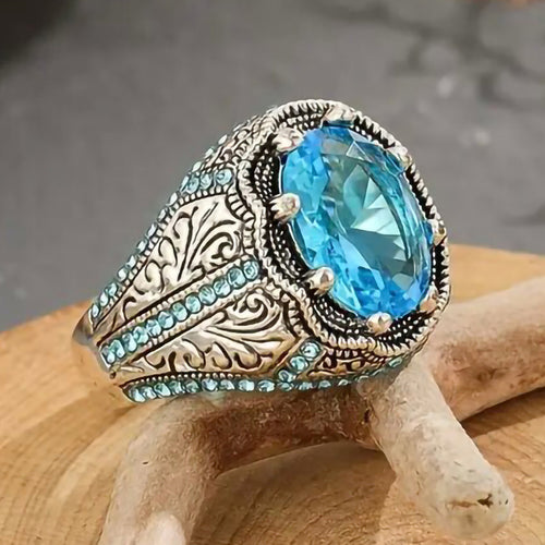 Second product view showing antiqued silver-tone aqua oval-stone engraved signet ring