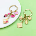 Flower Charm Keychains Featuring Magenta Lipstick Across 43 Pictured Variations view 3