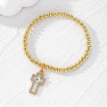 Gold Tone Beaded Crystal Evil Eye Flower Star and Cross Bracelets view 11