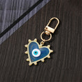 Gold Tone Pearl Edge Heart Evil Eye Clip Keychains view 2