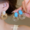 Oval Cabochon Knot Earrings in Turquoise Blue and Pearl White view 1