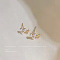 Gold Tone Curved Branch And Three White Pearl Mini Stud Earrings view 4