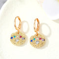 Gold Tone Ornate Evil Eye Medallion Huggie Earrings in Eight Designs view 2