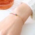 Gold Red Cord Birthstone Bracelet with Round Zircon Charm view 6