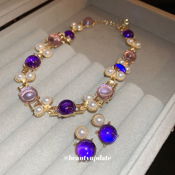 Purple Cabochon And Pearl Like Necklace And Earrings In Gold Tone