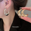 Pair of Metal Tone Wide Polished C-Shaped Hoop Earrings in Two Sizes view 3