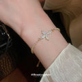 Gold Tone Pink Cross Crystal Slider Bracelet With Extra Gallery Colors view 3