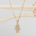 Gold Tone Crystal Boy and Girl Figure Pendant Necklaces view 2