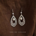 Silver Tone Openwork Teardrop Flower And White Pearl Hook Earrings view 1
