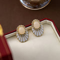 Gold Tone Oval Cabochon White Enamel Fan Stud Earrings view 3