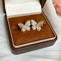 Gold Tone Butterfly Stud Earrings with Pink Crystal Centers view 6