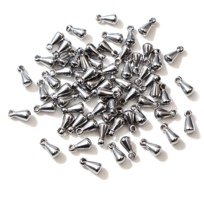 Steel Tone Mini Teardrop End Charms With Top Loop, grouped overview on a plain background