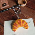 Croissant Figure Keychain with Split Ring and Snap Hook view 4