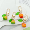 Citrus Fruit Charm Keychains Featuring Fruit Across 8 Pictured Variations view 3
