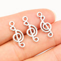 Silver Tone Treble Clef Music Note Charms with Top Loops view 1
