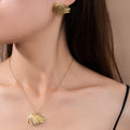 Gold Tone Feather Stud And Star Plaque Huggie Earrings view 2