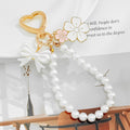 Pearl Bead Wristlet Keychain with Bow and Sakura Flower Charms view 4