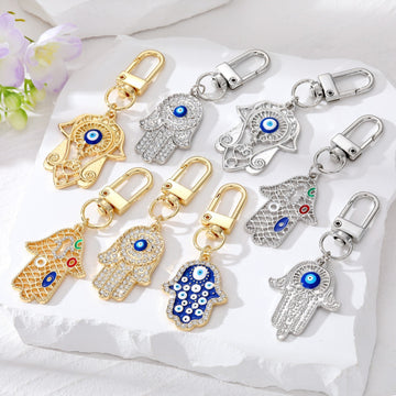 Gold and Silver Tone Crystal Hamsa Hand Evil Eye Clip Keychains in Ten Designs