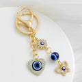 Blue Evil Eye Rhinestone Heart Gold Tone Charm Keychain view 8