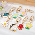 Gold Tone Colorful Whale Octopus Cat and Flower Clip Keychains view 1